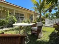 2Br near Coral Beach- Coconut Villa, hear the waves and relax!