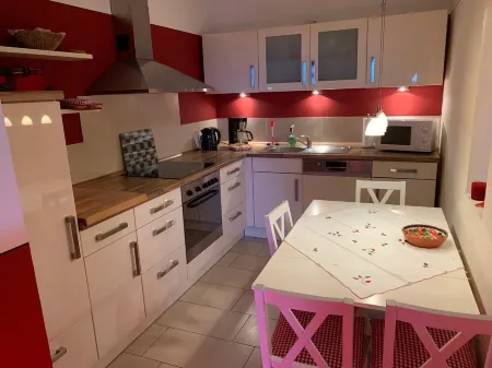 Romatic apartment in the countryside with loggia, sauna area, garden, pond, horses