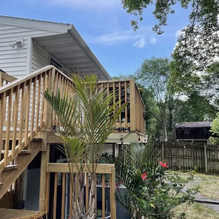 Contemporary home in quiet neighborhood with pool & great back yard close to all