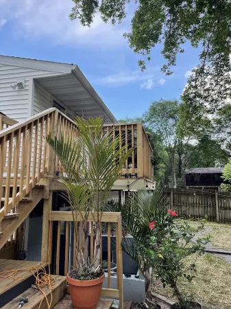 Contemporary home in quiet neighborhood with pool & great back yard close to all