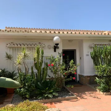 Charming Beachfront Bungalow in Torrox Costa - Perfect Family Retreat