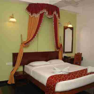 Hotel Theni International Rooms