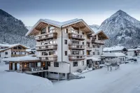 Sonnenhof Genusshotel & Appartements Hotel dekat Fischergut