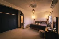 The Kozyhome Hotels in Tarmigte