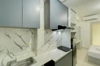 Comfy and Tidy Studio Transpark Cibubur Apartment by Travelio