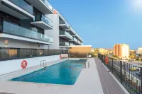 Contemporary One-Bedroom Apartment Отели в г. Альгарробо
