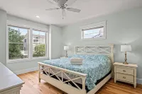 Beautiful Bayfront w/ Heated Pool & Dock.  6 Bedrooms, all w/ Ensuite Bathrooms.