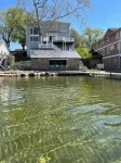 Spacious House + boat house on clear, sandy-bottom lake. Arcade + Billiards room