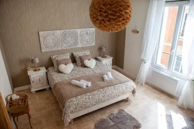 Appartement « Un Moment Dévasion » en Plein Cœur Dépernay Hôtels à proximité de : Opticien Épernay - pl. Léon Bourgeois - Krys