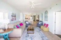Luxurious 2nd floor beachfront condo w wrap-around balcony @ The Enclave - Private Pools
