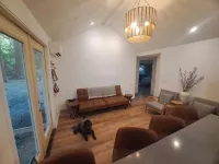 The Groundskeeper's Cabin: A peaceful retreat with all the amenities of home.