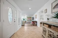 Near beaches! 2100 square foot heated pool home on the Golf Course!