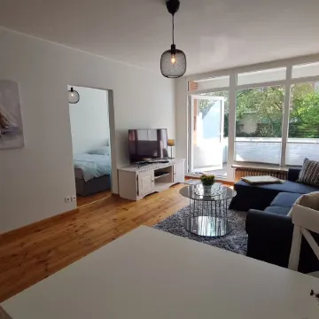 Modern city apartment with balcony and private parking space in a quiet location