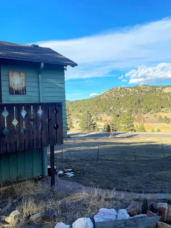 Stay in this charming vintage cabin with a wood burning fireplace,