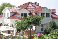 Family-friendly comfort apartment, 100 m to the Baltic Sea beach, with lagoon view