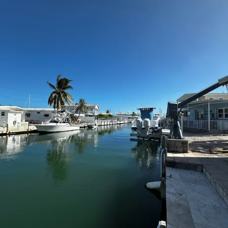 Canal-Front Coastal Escape with Private Dock & King Suite