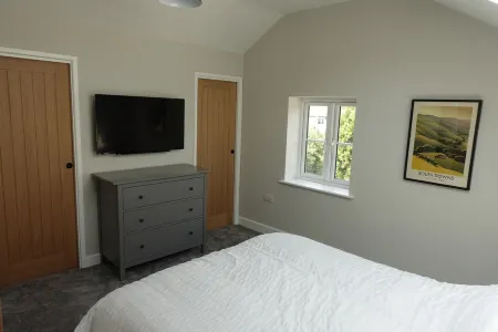 Relax in our village located Old Bakery Cottage Отели в г. Аран Дистрикт