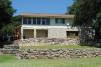 Lake Front property on Inks Lake with beautiful lake views /dock/swimming area.