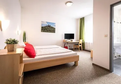 Hotel an der Burg Hotels in Heuchelheim