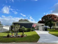 Delightful Home with Golf Cart and Enclosed Lanai - Cozy Haven