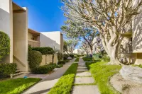 Pool and Tennis Courts - Bright Coastal Retreat