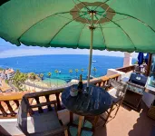 Ocean View Balcony and Golf Cart - Stylish Coastal Escape