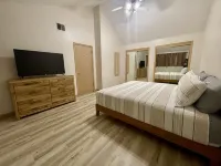 Gas Fireplace and Outdoor Landing with Seating - Charming Oasis Hotels in La Porte