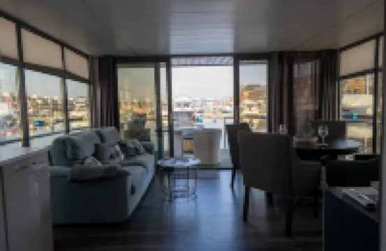 Houseboat Luv in Sonwik harbor with a view of Denmark