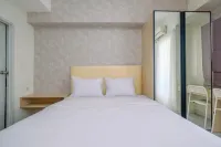 Comfy and Stylish Studio Podomoro Golf View Apartment by Travelio - Parkplatz