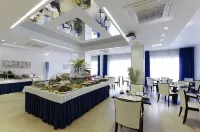 裏米尼郎格梅爾美居酒店 - 早餐