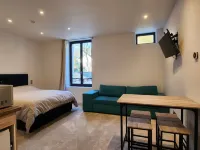 HDG Hôtel Gare de L'Isle Adam Appart's Hotel Hôtels à : Parmain