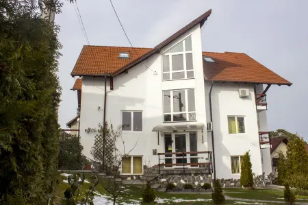 Pensiunea Riunione Отели рядом с достопримечательностью «DASH»