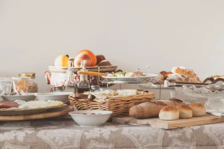 Atenea Luxury Suites - Atenea Collection Отели рядом с достопримечательностью «Храм Зевса Олімпійського»