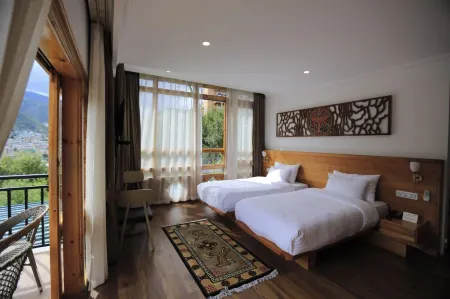 Phuntsho Khangsar Hotel Отели в г. Юзипанг