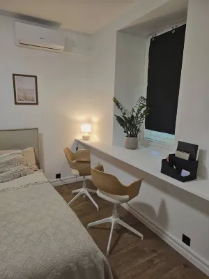 Apartment with a fire-place