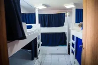 Nômades Vibe da Ilha - Adventure Hostels & Coworking