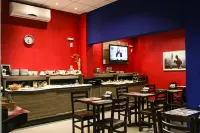 Tri Hotel Smart Criciuma - breakfast
