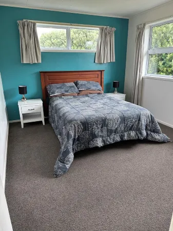 Pohutukawa Retreat Отели в г. Опунейк