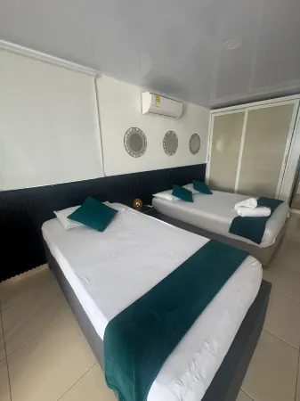 Aloha Beach Sai Отели рядом с достопримечательностью «Плайя Спрат Бигт»