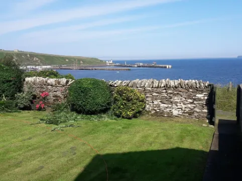 Bungalow with sea-view, near small town of Thurso.