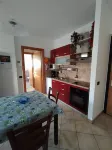 Apartment with private garden two steps from the lake.