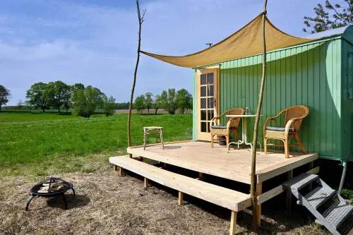 Bee wagon with fireplace & sauna can be used all year round in the natural garden