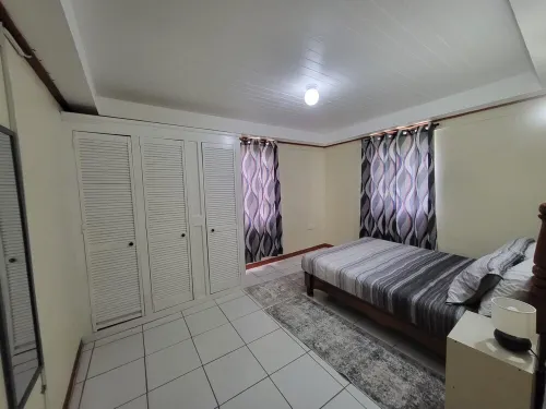 Fully furnished 3BR home in Sylvania with Wi-Fi, AC, kitchen & serene views. Hotel a Mahaut