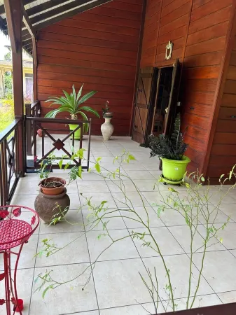 Wooden villa in the countryside with Creole garden ideal for couples