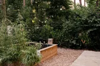 Luxury Spa Tiny House with hottub, in the woods, Japandi style Hotel a Nunspeet