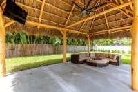 Pool Home W Beautiful Tiki Hut - 3 Bed 3 Bath. 1 Mile from Beach! - 4-Star
