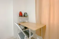 Simple White Accent Studio at Apartment Paltrow City By Travelio