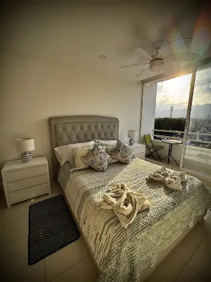 Apto Moderno 3 Hab-Agua 24-7-Central-AC Hoteles en 