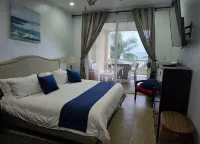 Amazing oceanfront with access Crocs Resort - ที่มีอ่างอาบน้ำ
