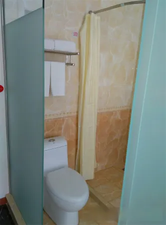 Shankee Hotel (Jiaokou Chengxi Street) Отели рядом с достопримечательностью «Народное правительство округа Сокко»